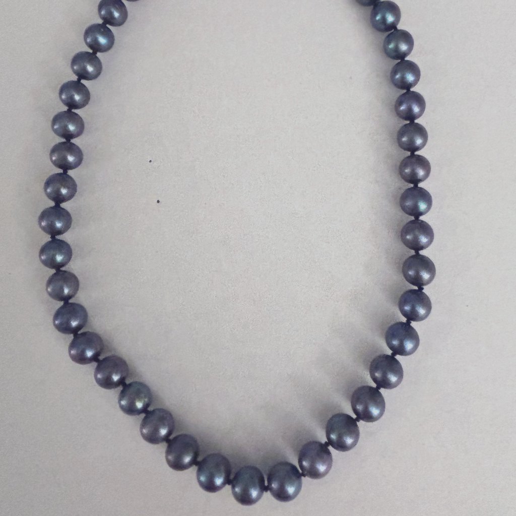Strand Of Black Pearls